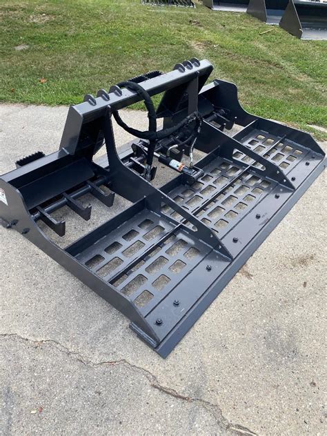 best skid steer attachment for gravel driveway|skid steer ground leveler attachments.